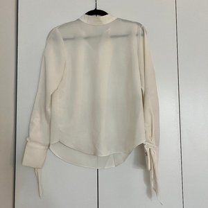 Mock neck sleeve detail blouse